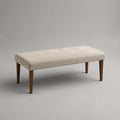 Banc rectangulaire rembourré en polyester beige et bois brun, 120 × 40 × 45 cm